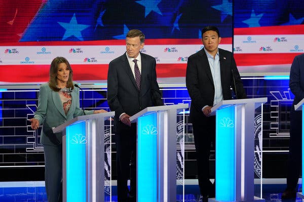 Marianne Williamson, John Hickenlooper and Andrew Yang during the second night of the Democratic presidential debates on Thursday, June 27, 2019.