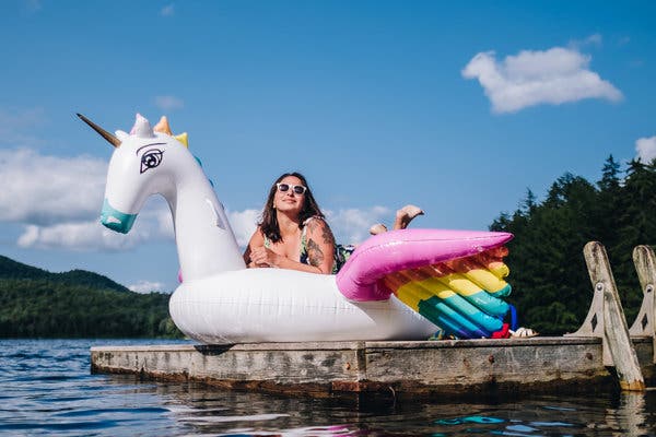 Anjali Pinto on a rainbow Pegasus float. Unicorns and swans are among the more popularly searched-for floats on the market.