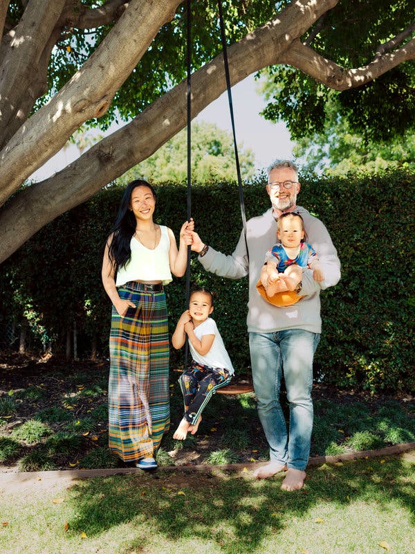 Zachary Lara and Sonya Yu (shown with their daughter, Evelyn, and son, August) bought and renovated a 1920s Spanish Colonial-style house in Los Angeles as their getaway.
