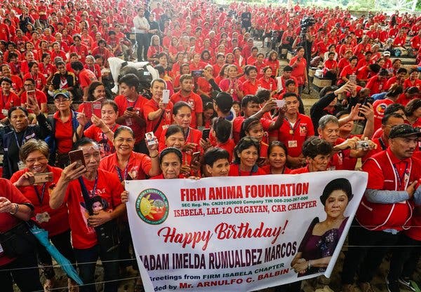 Supporters of Mrs. Marcos in Manila on Monday.