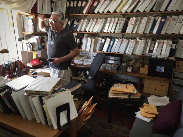 Tom O’Neill at his home office in Los Angeles, surrounded by 20 years of Manson-related files.