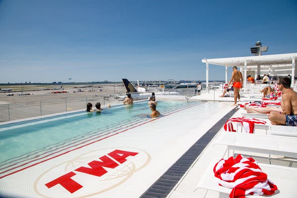 The rooftop pool offers a view of planes taking off and landing.