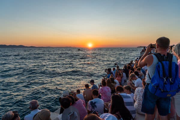 During the high tourist season, dense crowds gather at Zadar&rsquo;s Sea Organ every evening to watch the sunset.