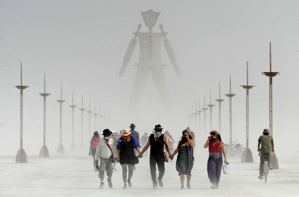 That figure in the distance, obscured by the dust? He’s the man they burned at Burning Man 2014.