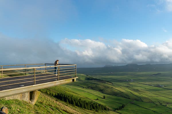 The Serra do Cume viewpoint on the island of Terceira extends over a patchwork of verdant farmland.