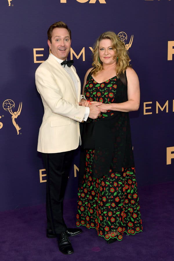 Thomas Lennon and Jenny Robertson on the Emmys’ purple carpet.