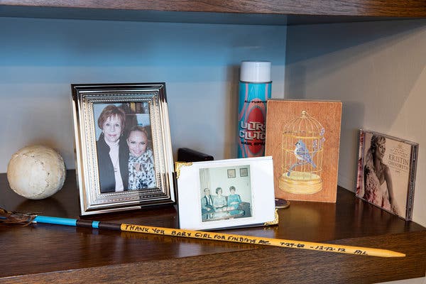 Family photos mix with pictures of Kristin Chenoweth with celebrities like Carol Burnett.