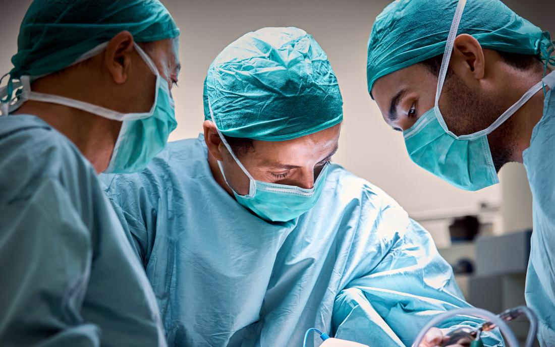 surgeon performing angioplasty