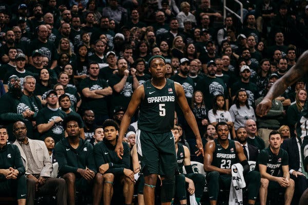 Cassius Winston, pictured during a game against Illinois, scored a career-high 32 points against Michigan on Sunday with his parents and his brother Khy watching. 
