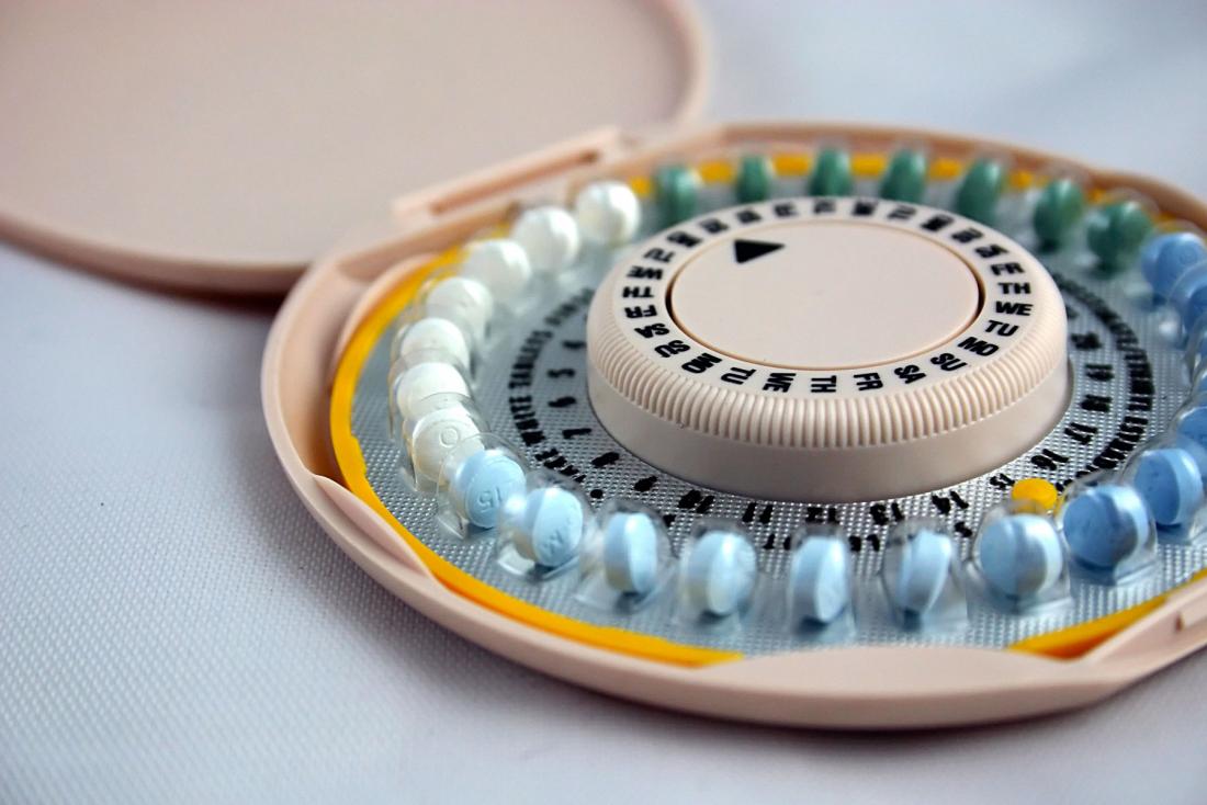 birth control pill which may cause white discharge before period