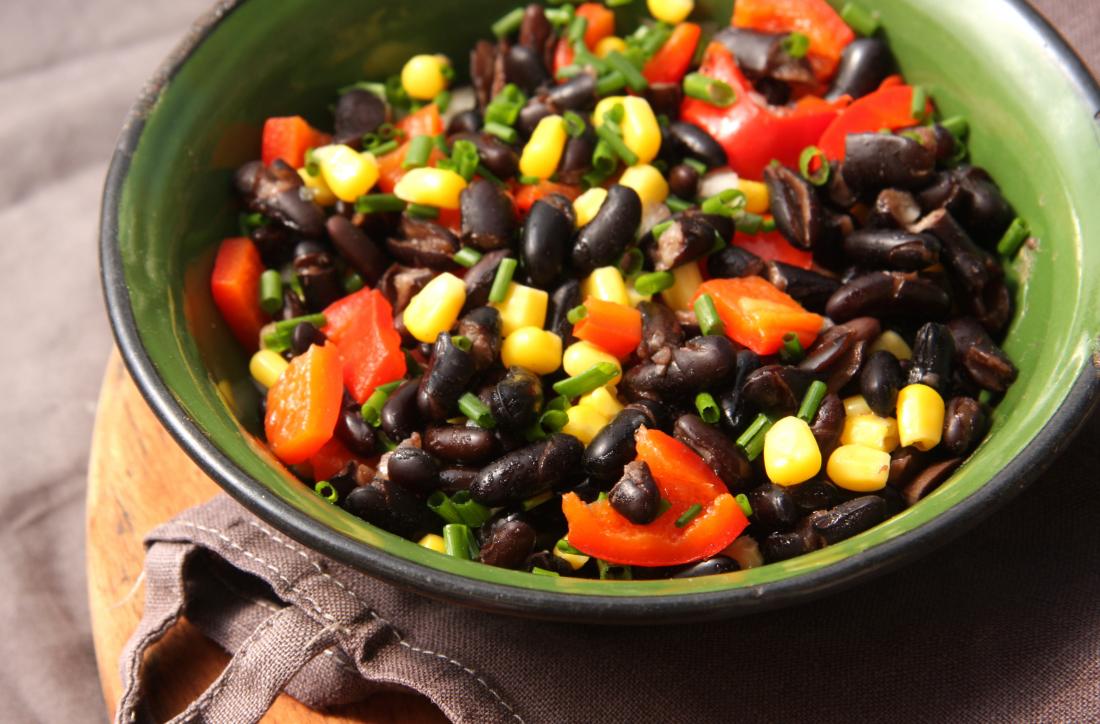 Black bean salad in bowl with red pepper and sweetcorn