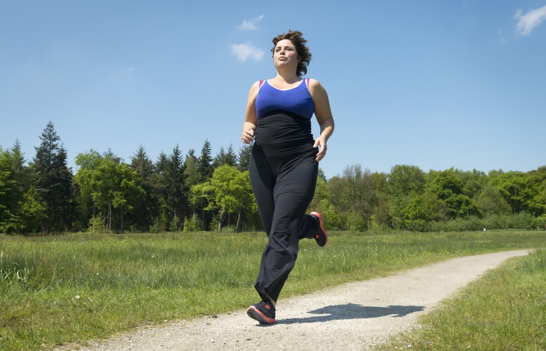 Woman outdoors running