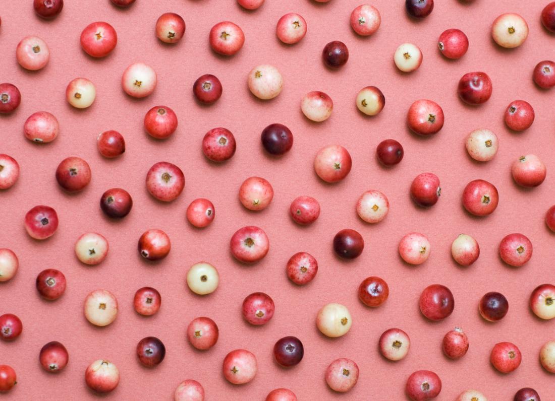 pattern of cranberries on pink background