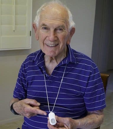 Mr. Dibner, wearing a Lifeline device, at his home in Arizona in 2016. He had memories of a 70-year-old family friend having a stroke and not being found for three days when he was a young man.