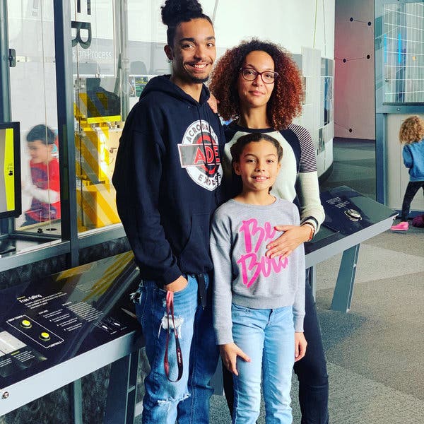 Heather and her two children at the Adventure Science Center in Nashville in 2018.