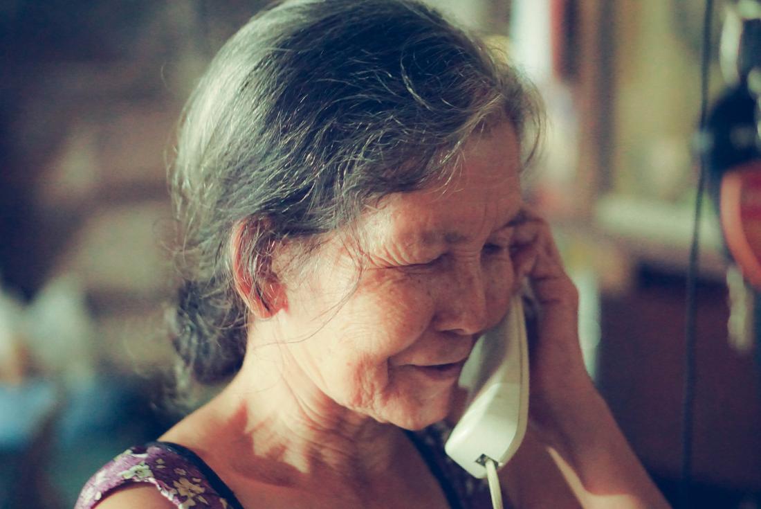 older woman speaking on the phone