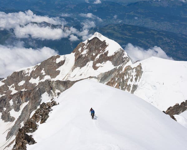 Hikers on Mont Blanc. Officials and mountain guides are becoming increasingly concerned about the effects of climate change and the number of unskilled climbers attempting the summit.