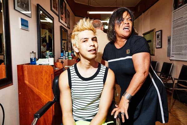 Mr. Torres has been going to his hairstylist, Marcy Ozuna, right, for about 10 years.