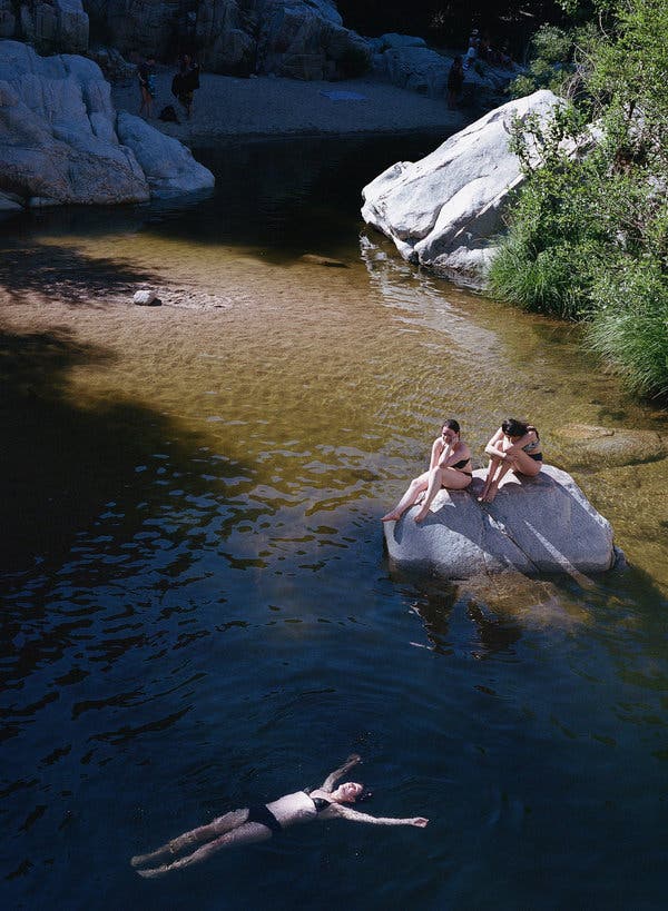 Floating, at Aztec Falls in San Bernardino County, Calif.