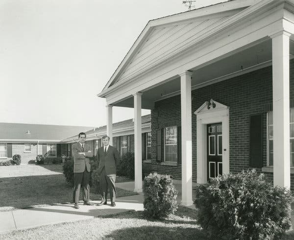 Mr. Cherry and Mr. Jones outside their first nursing home in 1961.