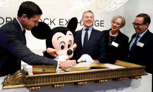 Oh, Mickey, you’re so fine! Mr. Iger and the Disney mascot signed a guest book before ringing the opening bell of the New York Stock Exchange in 2017. 