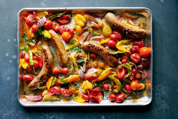 Sausage is a gift to weeknight cooks. Here’s they are quickly cooked on a sheet pan with peppers and tomatoes.