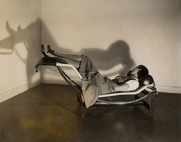 The designer Charlotte Perriand on the Chaise Longue Basculante B306 (1928-1929) by Le Corbusier, Charlotte Perriand and Pierre Jeanneret, circa 1928.