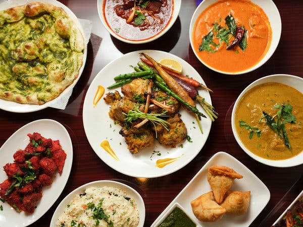 Goan staples like toasted coconut xacuti and an almost fruity fish curry are served alongside northern-style tandoori grilled meats and buttered curries.