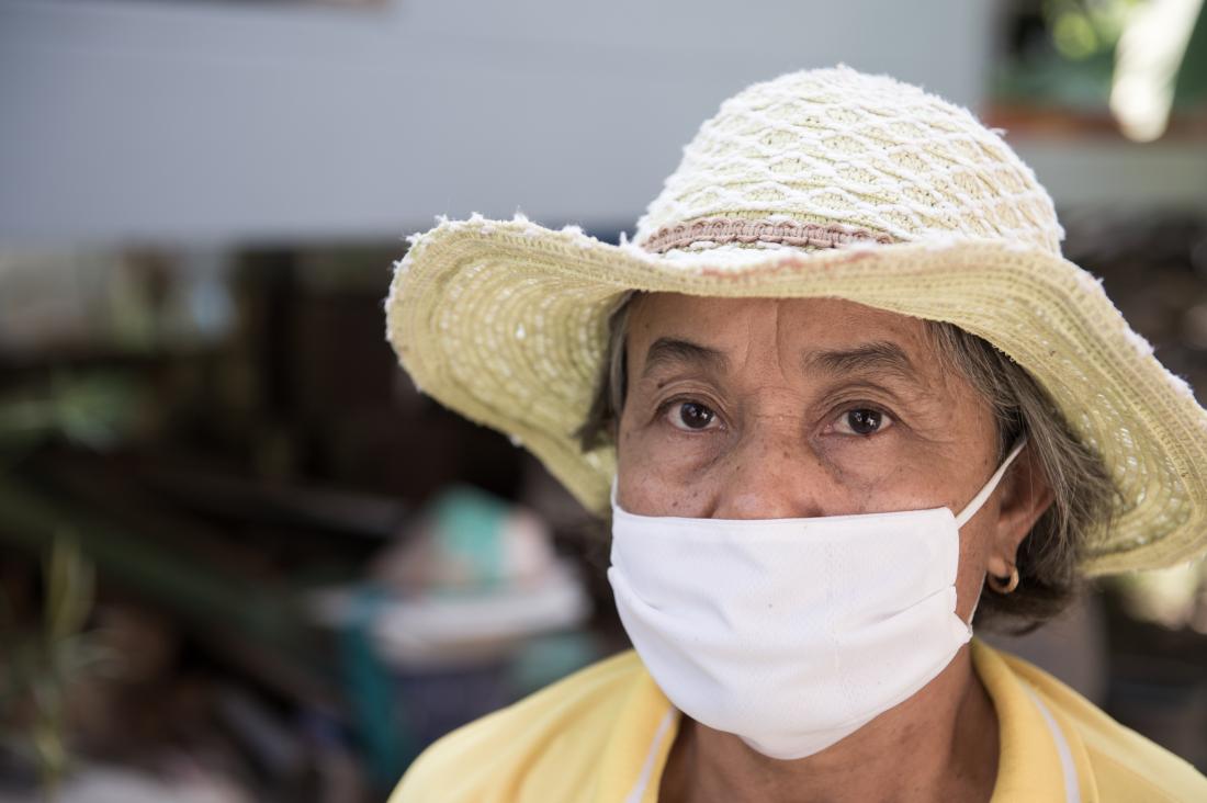 older woman wearing surgical mask