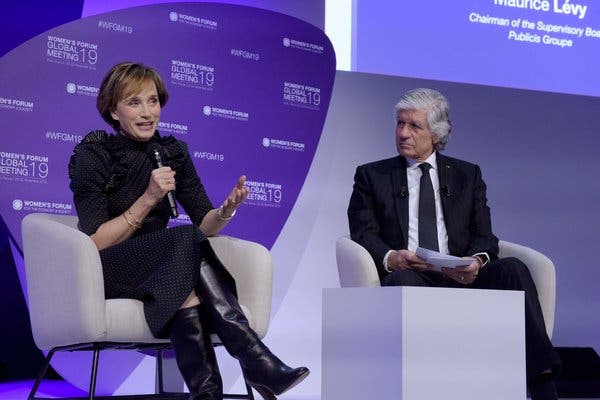 Kristin Scott Thomas opening the Global meeting of the Women's Forum in Paris, with Publicis chairman Maurice Levy.