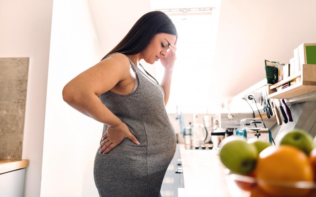 a woman experiencing a UTI in pregnancy. 
