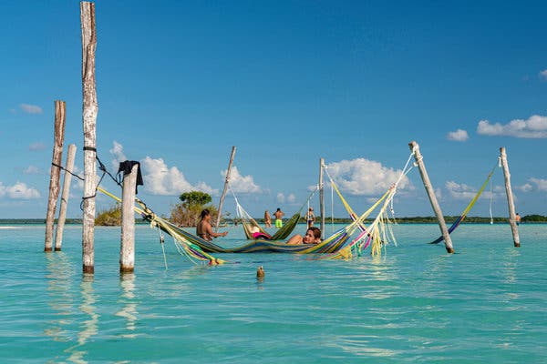 Hammocks for lounging in the water have been set up in the laguna. 