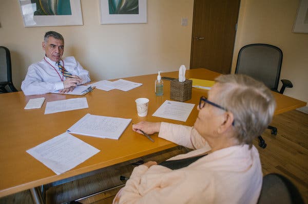 Dr. Dimitris Kiosses with Ms. Firmender. She said the treatment helps her focus on solving problems.