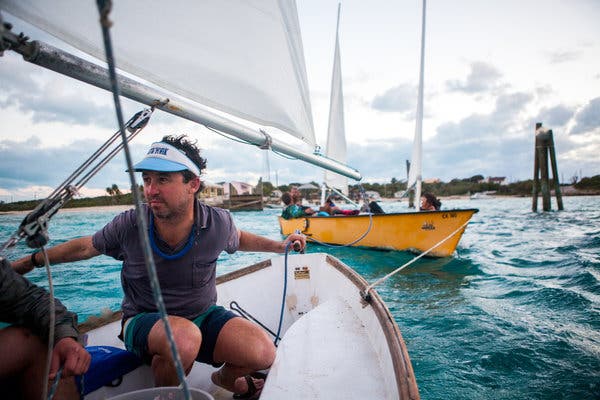 The author, Porter Fox, sailing from Little Farmer's Cay to Big Farmer's Cay.