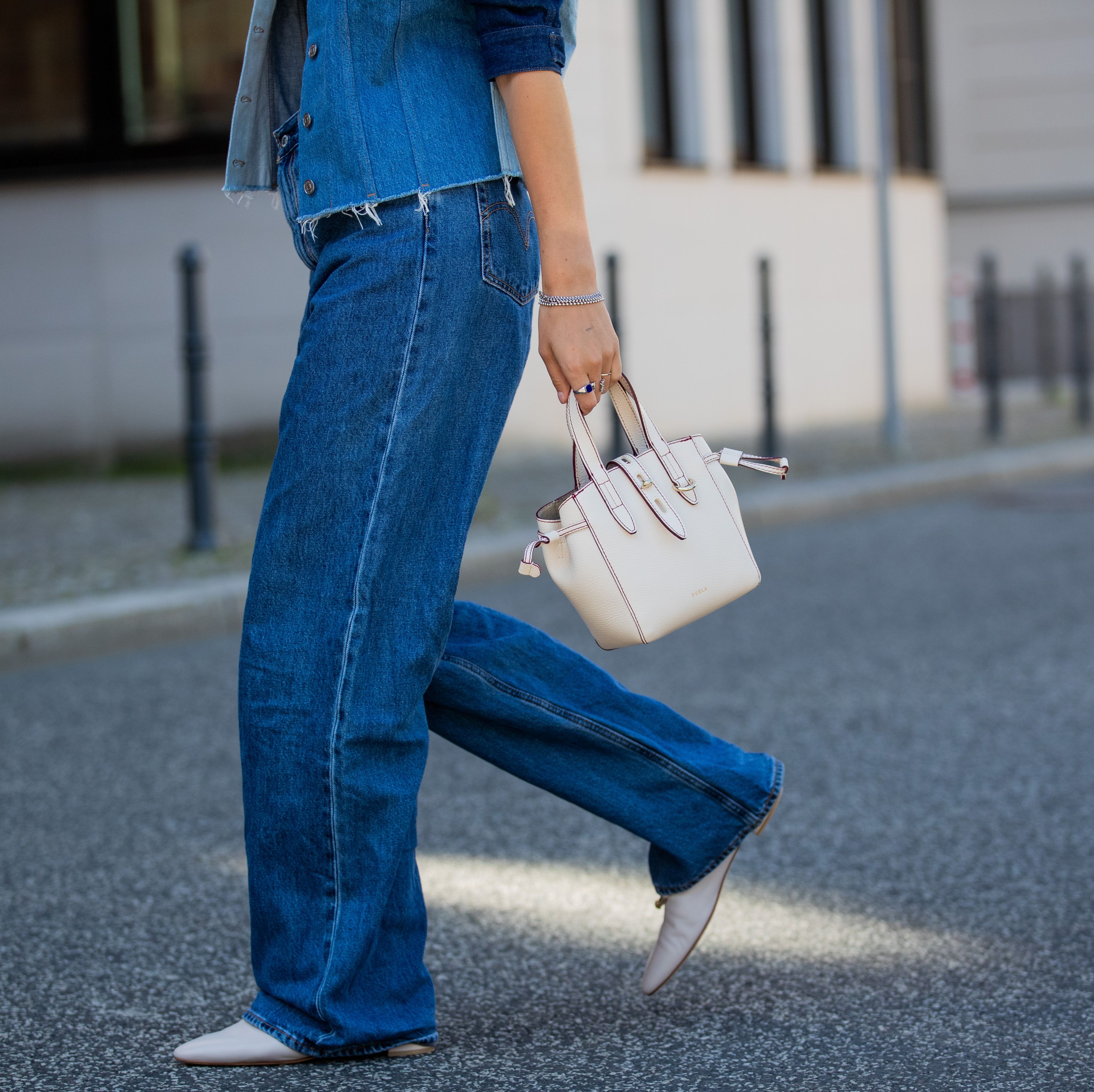 berlin, germany june 02 jacqueline zelwis is seen wearing 7 for all mankind x marques almeida denim jacket, white cropped top
zara, levis jeans, agl shoes, furla bag on june 02, 2021 in berlin, germany photo by christian vieriggetty images