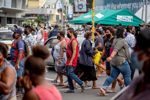 Wearing face masks in Suva, Fiji, early this month.