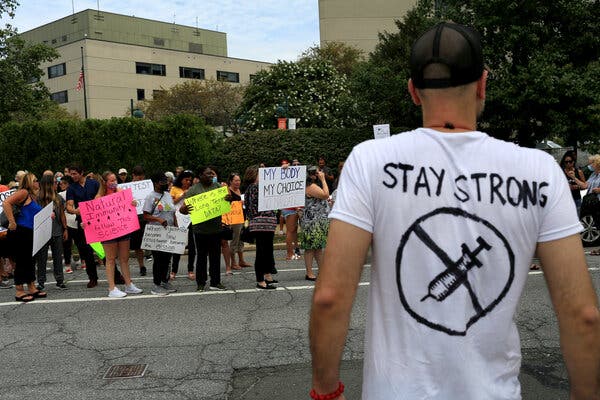 Employees at Staten Island University Hospital who are opposed to mandatory vaccination and testing protested last week.