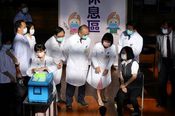 President Tsai Ing-wen of Taiwan, seated, received a dose of the domestically made Medigen Covid-19 vaccine on Monday.