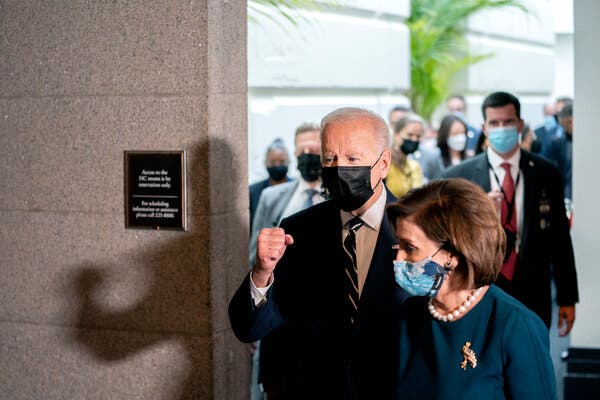 President Biden and Speaker Nancy Pelosi at the Capitol on Thursday. The framework leaves out several key planks of the economic agenda that the president laid out on the campaign trail and shortly after taking office.