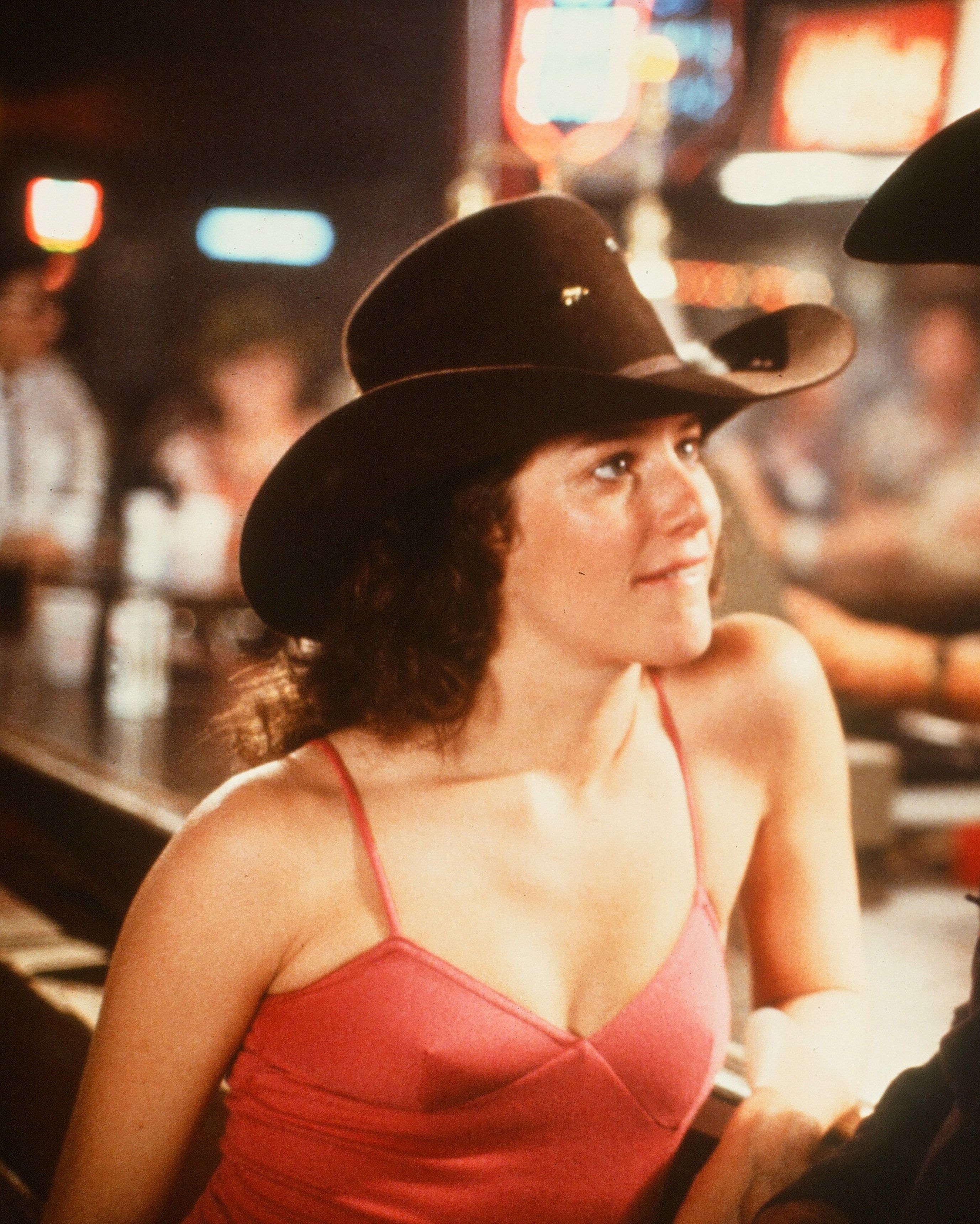 circa 1980 actor john travolta and debra winger talk in a scene during the paramount pictures movie 'urban cowboy" circa 1980 photo by hulton archivegetty images