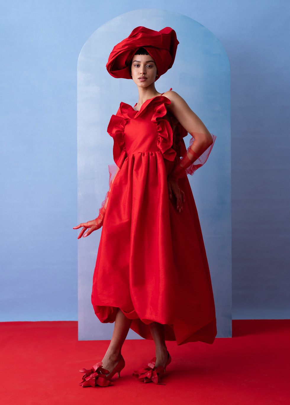 a woman in a red dress