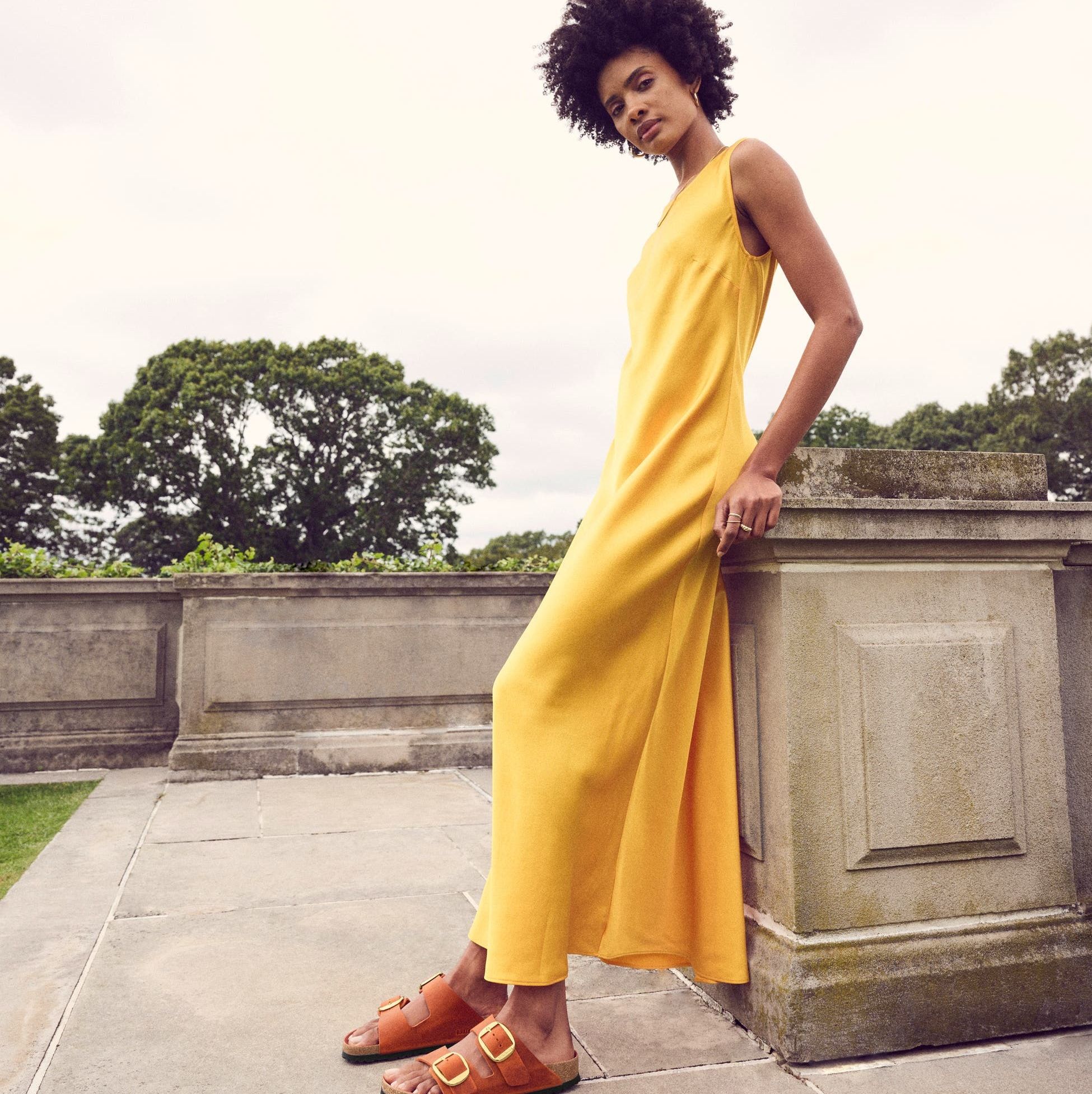 a person in a yellow dress