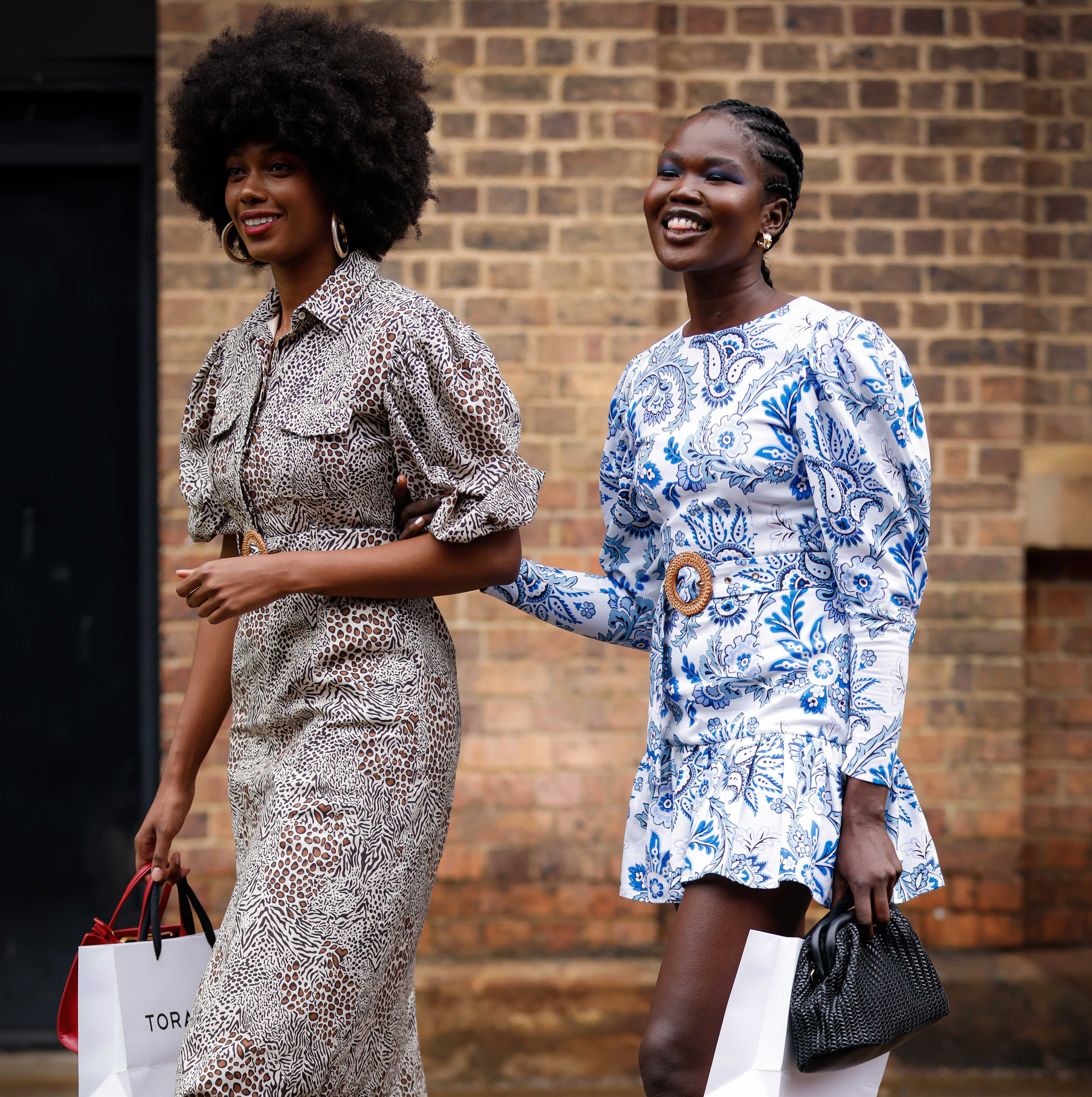 a couple of women smiling