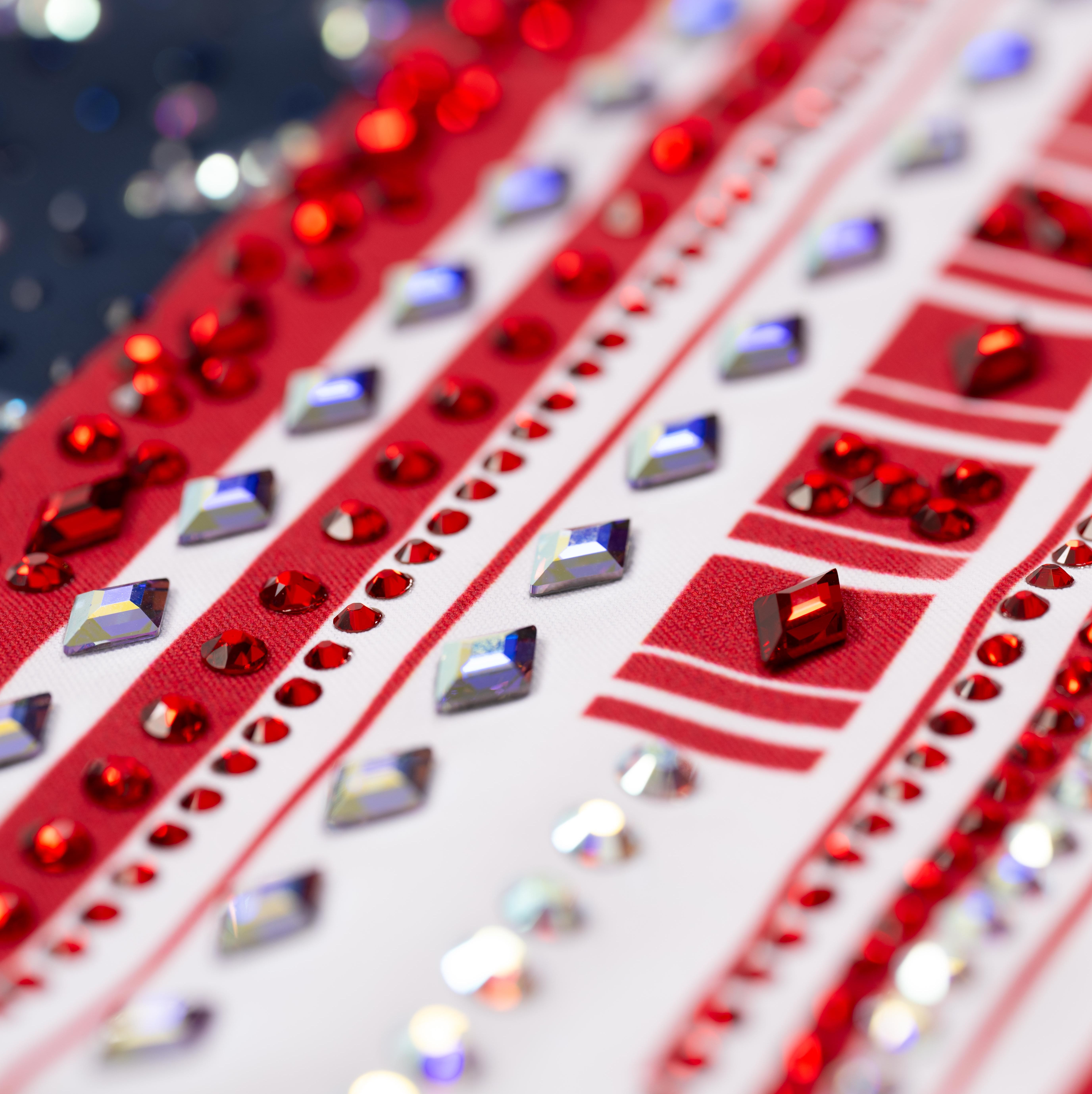 a close up of a red and white checkered surface