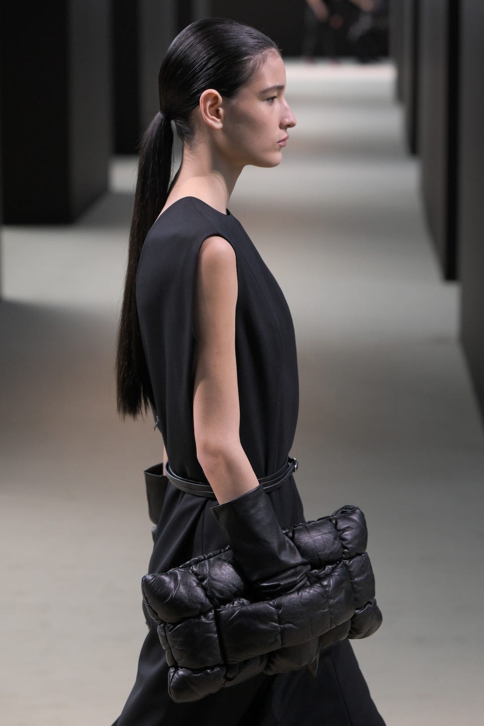 model on the runway at cos rtw spring 2025 held at the agger fish building as part of new york ready to wear fashion week on september 10, 2024 in new york, new york