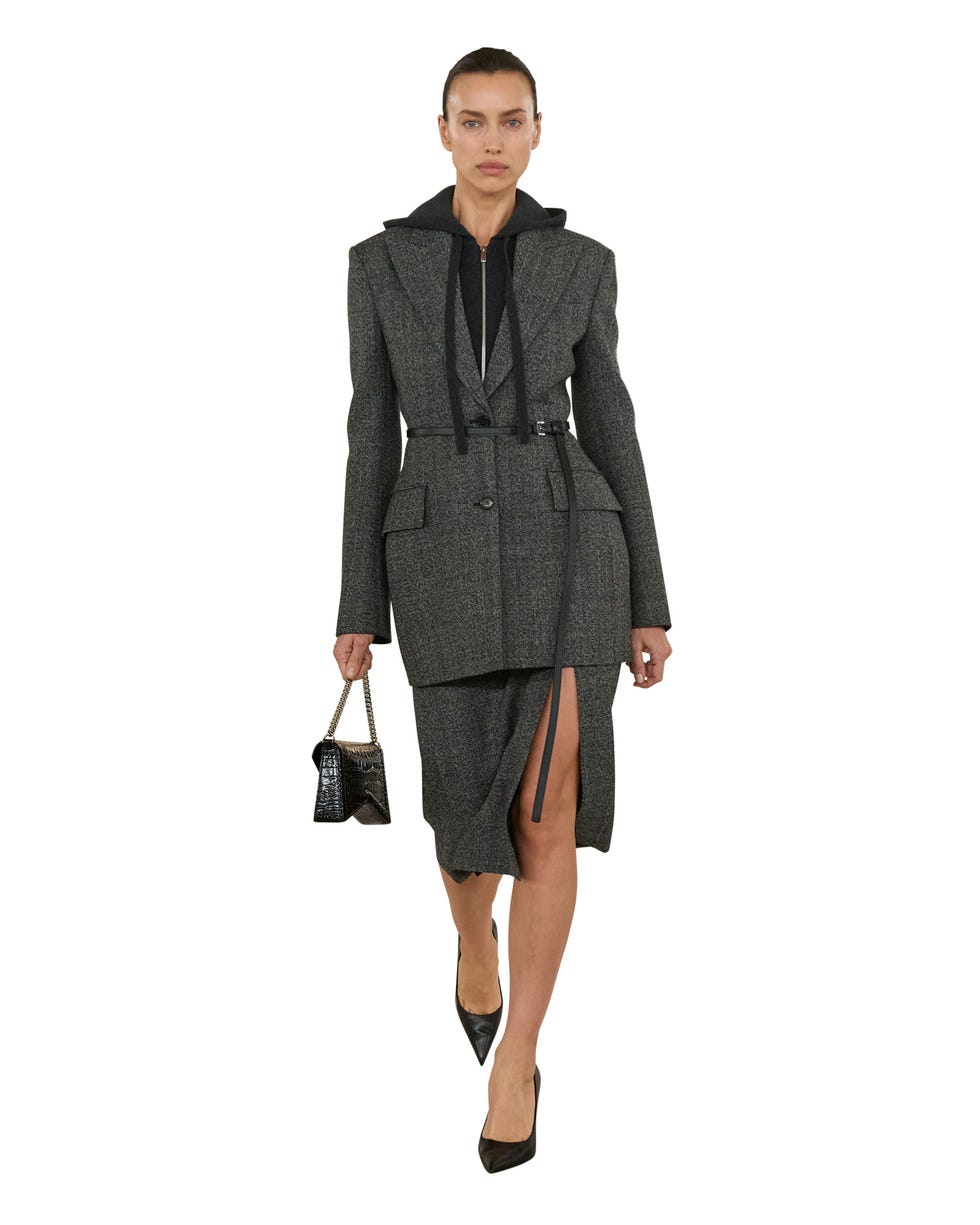 a woman in a michael kors suit