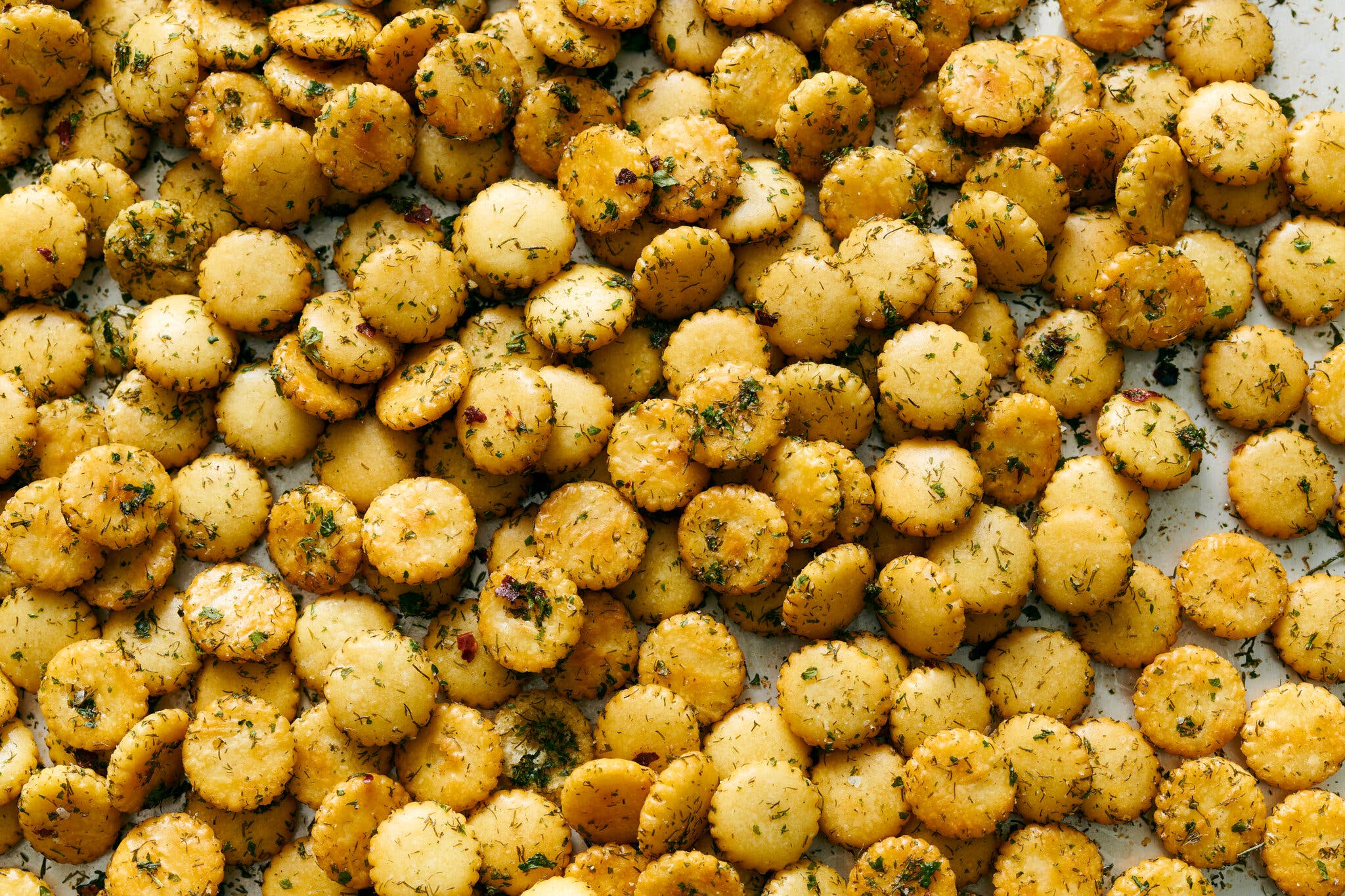 Oyster crackers are coated with spices.