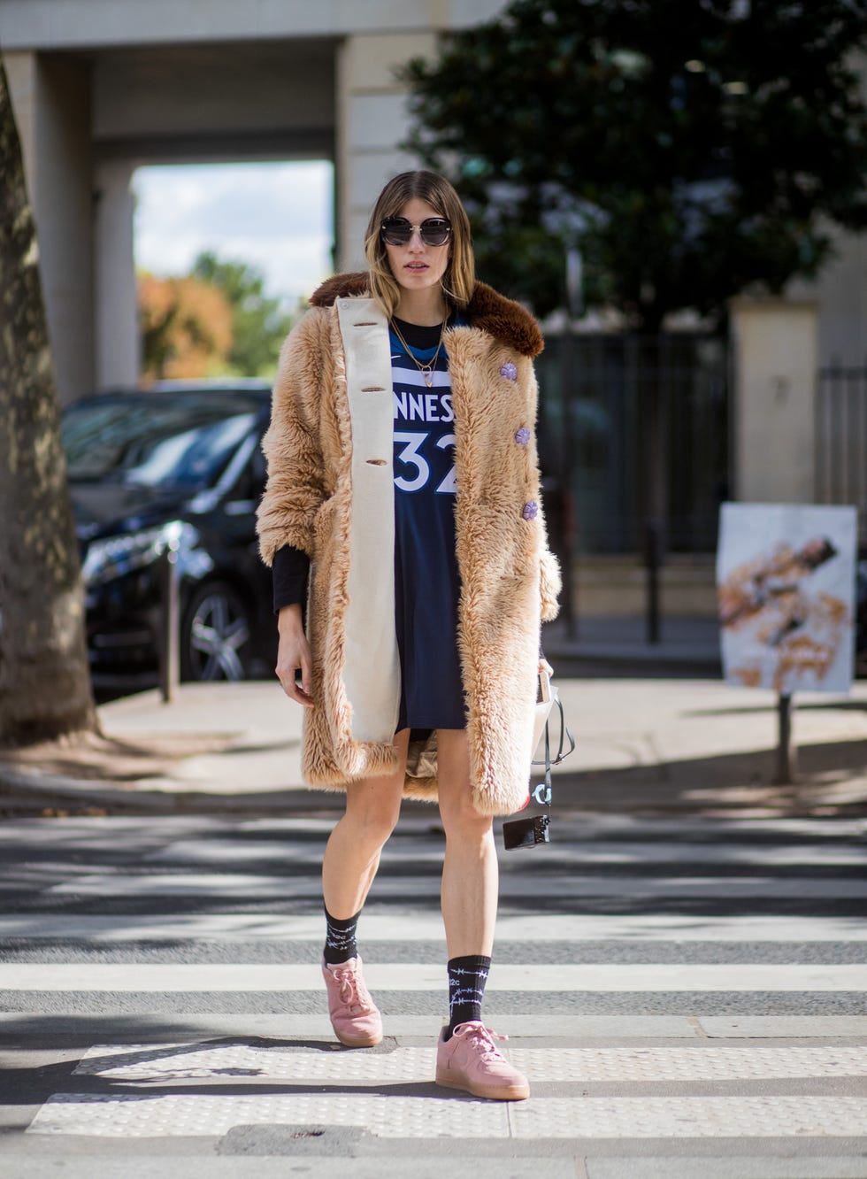 paris, france october 03 veronika heilbrunner wearing teddy coat, football jersey seen outside miu miu during paris fashion week springsummer 2018 on october 3, 2017 in paris, france photo by christian vieriggetty images