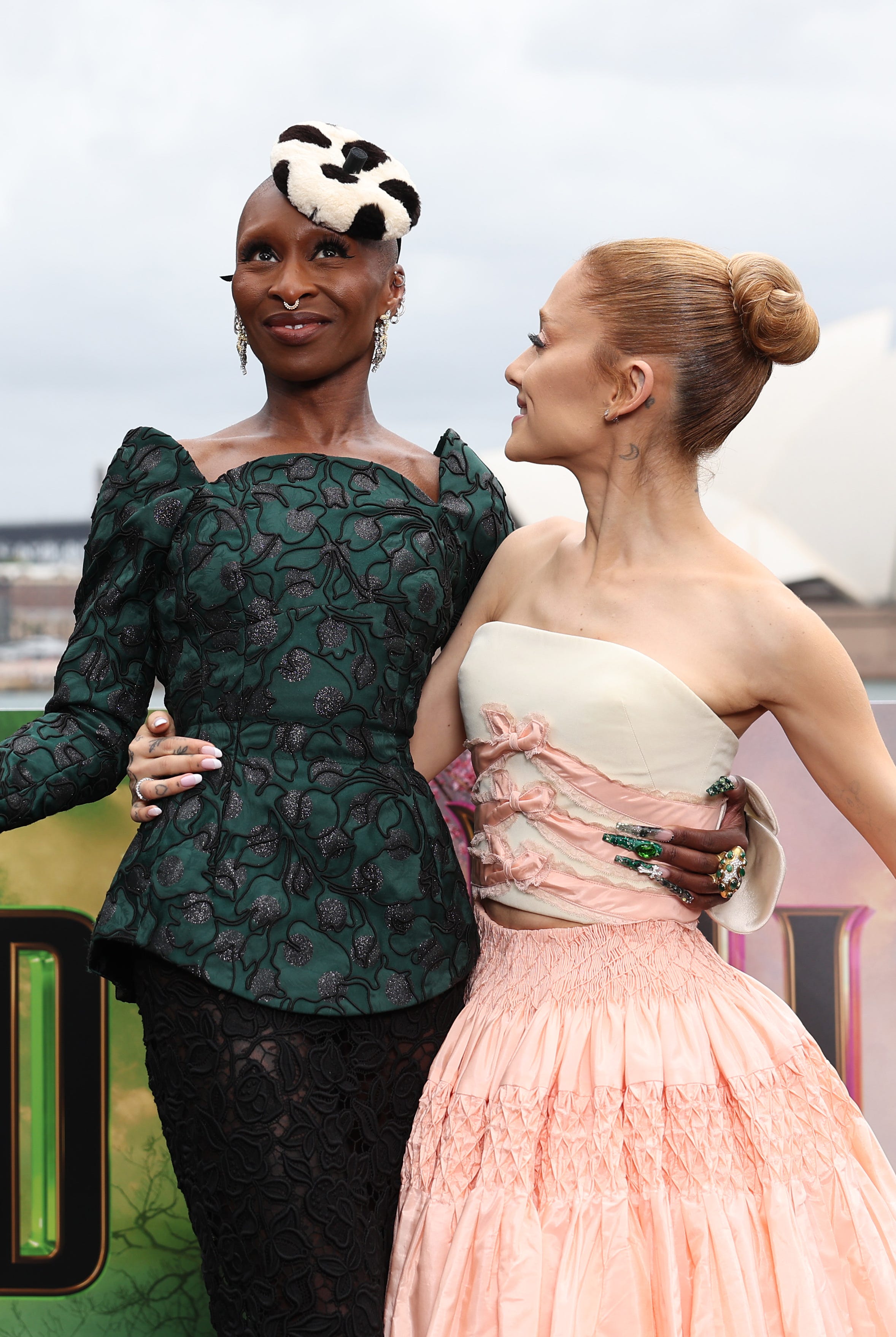 cynthia erivo and ariana grande pose for a photocall at mrs macquaries chair during the australian premiere of wicked at on november 05, 2024 in sydney, australia