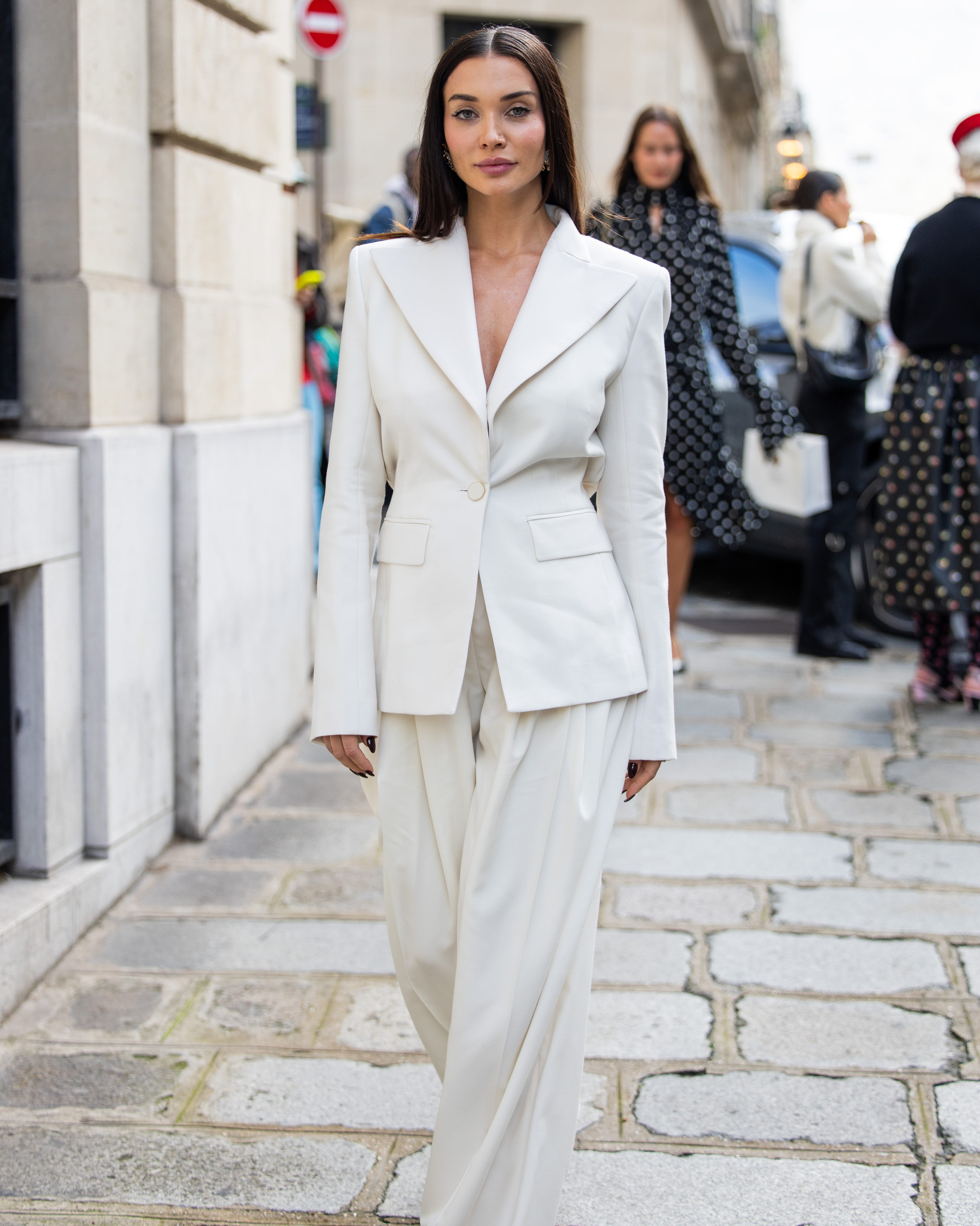 paris, france september 27 amy jackson wears white suit outside nina ricci during womenswear springsummer 2025 as part of paris fashion week on september 27, 2024 in paris, france photo by christian vieriggetty images